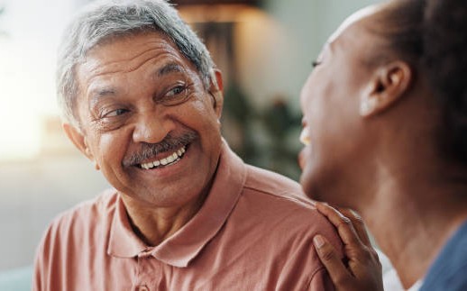Happy elderly man reviewing Medicare insurance in Florida